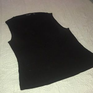 Black sleeveless blouse with asymmetric neckline